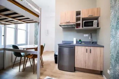 Cuisine ou kitchenette dans l'établissement Studios Saint Jacques, Châtellerault