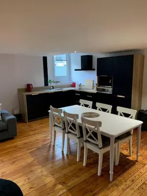 Cuisine ou kitchenette dans l'établissement Appartement #4 cœur de ville