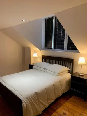 Un ou plusieurs lits dans un hébergement de l'établissement Appartement #4 cœur de ville