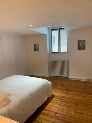 Un ou plusieurs lits dans un hébergement de l'établissement Appartement #4 cœur de ville