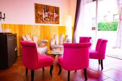 Coin salon dans l'établissement Chambre d'Hôtel Les Trois Lys