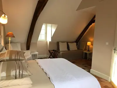 Un ou plusieurs lits dans un hébergement de l'établissement Le Grand Presbytère de Beaulieu