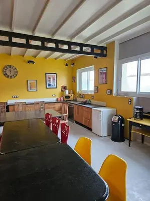 Cuisine ou kitchenette dans l'établissement La salle de jeux