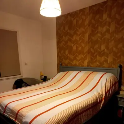 Un ou plusieurs lits dans un hébergement de l'établissement GARNIER House