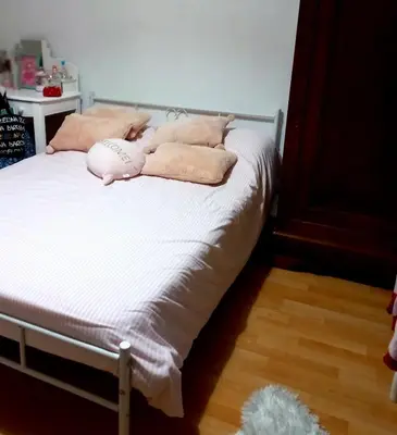 Un ou plusieurs lits dans un hébergement de l'établissement GARNIER House