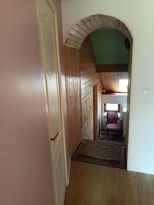 Un ou plusieurs lits dans un hébergement de l'établissement Chambre d'hôte 4 couchages