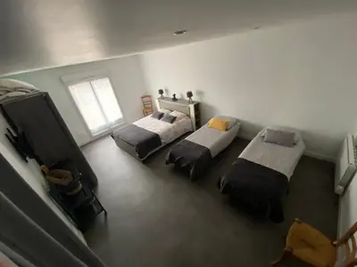 Un ou plusieurs lits dans un hébergement de l'établissement Logement spacieux 70m2