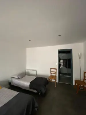 Un ou plusieurs lits dans un hébergement de l'établissement Logement spacieux 70m2