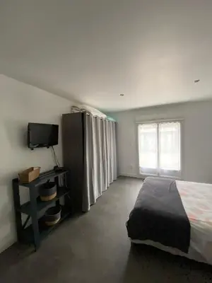 Télévision ou salle de divertissement dans l'établissement Logement spacieux 70m2