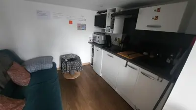 Cuisine ou kitchenette dans l'établissement STUDIO avec Terrasse et Parking, proche Tours