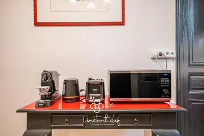 Cuisine ou kitchenette dans l'établissement Votre cocon 5 étoiles en plein centre du Mans
