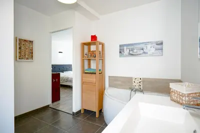 Un ou plusieurs lits dans un hébergement de l'établissement Villa Bugatti - Proximité 24h du Mans