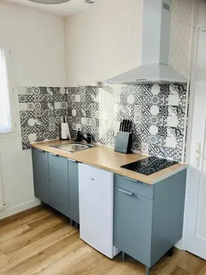 Cuisine ou kitchenette dans l'établissement Maison avec 2 chambres et jardin