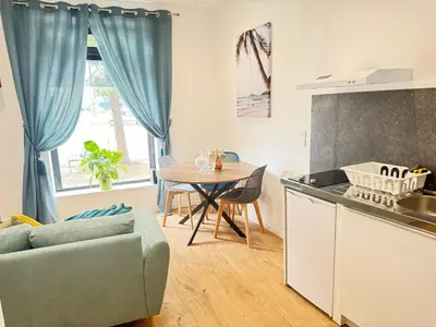 Cuisine ou kitchenette dans l'établissement Escale 1