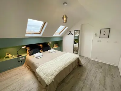 Un ou plusieurs lits dans un hébergement de l'établissement Gîte de charme avec piscine chauffée, clim et WiFi en Loire - FR-1-381-602