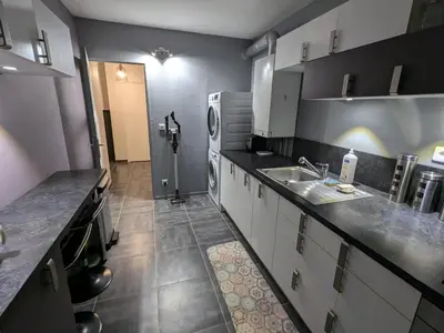 Cuisine ou kitchenette dans l'établissement Appartement idéal circuit des 24h du Mans