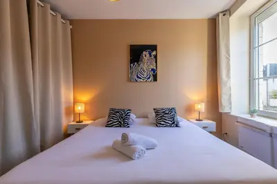 Un ou plusieurs lits dans un hébergement de l'établissement Le petit Oberlin, entre Chambord et Zoo Beauval
