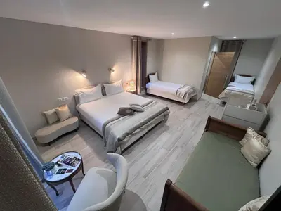 Un ou plusieurs lits dans un hébergement de l'établissement Le Chalet du Gîte de la Besnardière