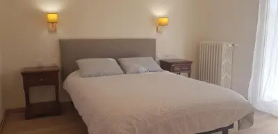 Un ou plusieurs lits dans un hébergement de l'établissement Les appartements de Mansart