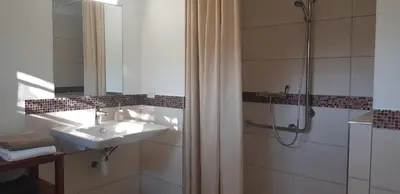 Salle de bains dans l'établissement Les appartements de Mansart