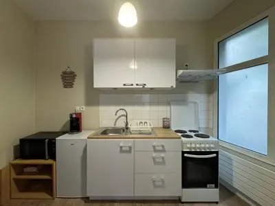 Cuisine ou kitchenette dans l'établissement Escale 21