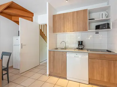 Cuisine ou kitchenette dans l'établissement Holiday Home Cottage Confort-4 by Interhome