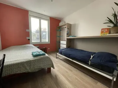 Un ou plusieurs lits dans un hébergement de l'établissement Studio Cosy renove 2023 avec garage