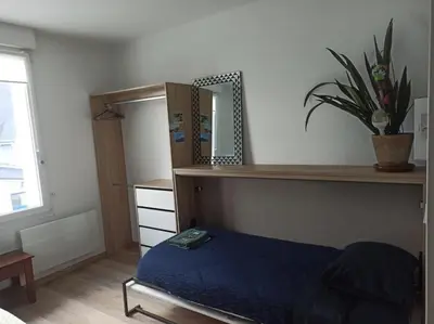 Un ou plusieurs lits dans un hébergement de l'établissement Studio Cosy renove 2023 avec garage