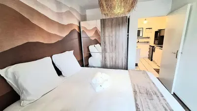 Cuisine ou kitchenette dans l'établissement Appartement cosy, balcon et place privée