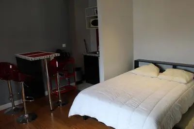 Un ou plusieurs lits dans un hébergement de l'établissement Magnifique appartement entre centre ville et gare - 5