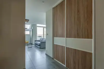 Coin salon dans l'établissement Appartement vue Cher sud Tours parking