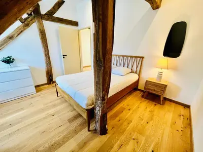 Un ou plusieurs lits dans un hébergement de l'établissement Le BIG duplex, hypercentre, 4 chambres, spacieux