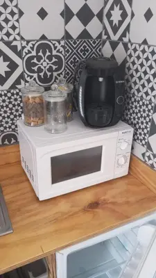 Cuisine ou kitchenette dans l'établissement La petite cabane