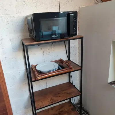 Cuisine ou kitchenette dans l'établissement Maison au calme avec jardin exotique pour 7 personnes