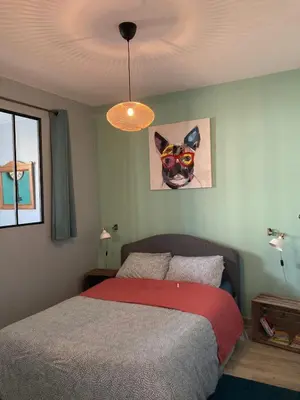 Un ou plusieurs lits dans un hébergement de l'établissement Appartement RICHELIEU