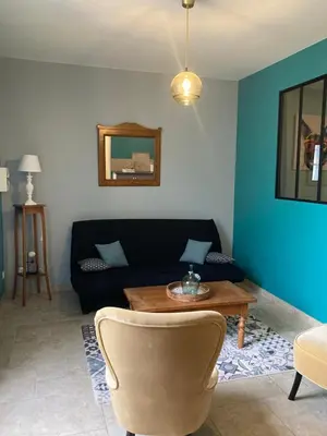 Coin salon dans l'établissement Appartement RICHELIEU