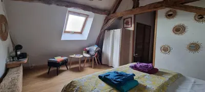 Un ou plusieurs lits dans un hébergement de l'établissement CHAMBRES D'HOTES EpLABONNE