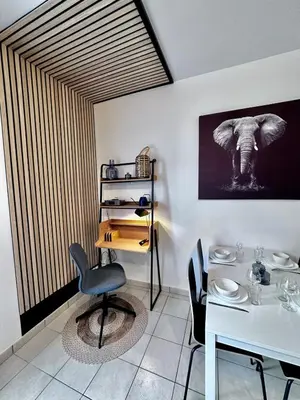 Coin salon dans l'établissement Appart T2 élégant 5 pers - Hypercentre - Spacieux