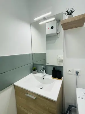 Salle de bains dans l'établissement Au Logis Briand
