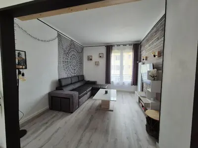 Coin salon dans l'établissement Appartement proche circuit 24h du Mans