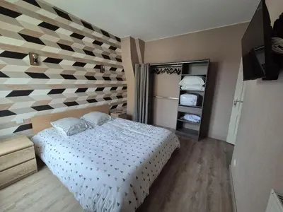 Un ou plusieurs lits dans un hébergement de l'établissement Appartement proche circuit 24h du Mans