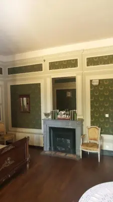 Coin salon dans l'établissement Le Manoir du coeur volant B&B