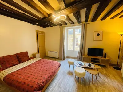 Un ou plusieurs lits dans un hébergement de l'établissement Le Studio du Vieux-Mans - 2 guests - Wifi