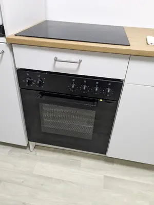 Cuisine ou kitchenette dans l'établissement Charmant studio
