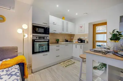 Cuisine ou kitchenette dans l'établissement Le code de Vinci