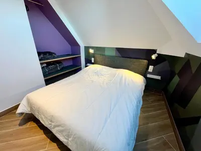 Un ou plusieurs lits dans un hébergement de l'établissement T3 climatisé face Loire et château l'appart du 4-1