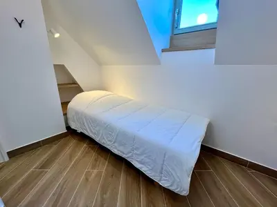 Un ou plusieurs lits dans un hébergement de l'établissement T3 climatisé face Loire et château l'appart du 4-1