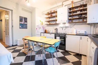 Cuisine ou kitchenette dans l'établissement Le 54 - Tours