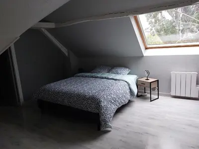 Un ou plusieurs lits dans un hébergement de l'établissement La Tourangelle