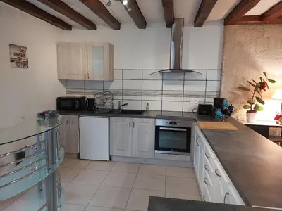 Cuisine ou kitchenette dans l'établissement La Tourangelle